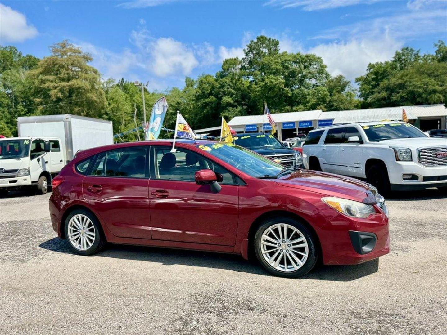 2014 Red /Black Subaru Impreza (JF1GPAD65E8) with an 2.0l H-4 Smpi Dohc 2.0l engine, Automatic transmission, located at 745 East Steele Rd., West Columbia, SC, 29170, (803) 755-9148, 33.927212, -81.148483 - Photo#2