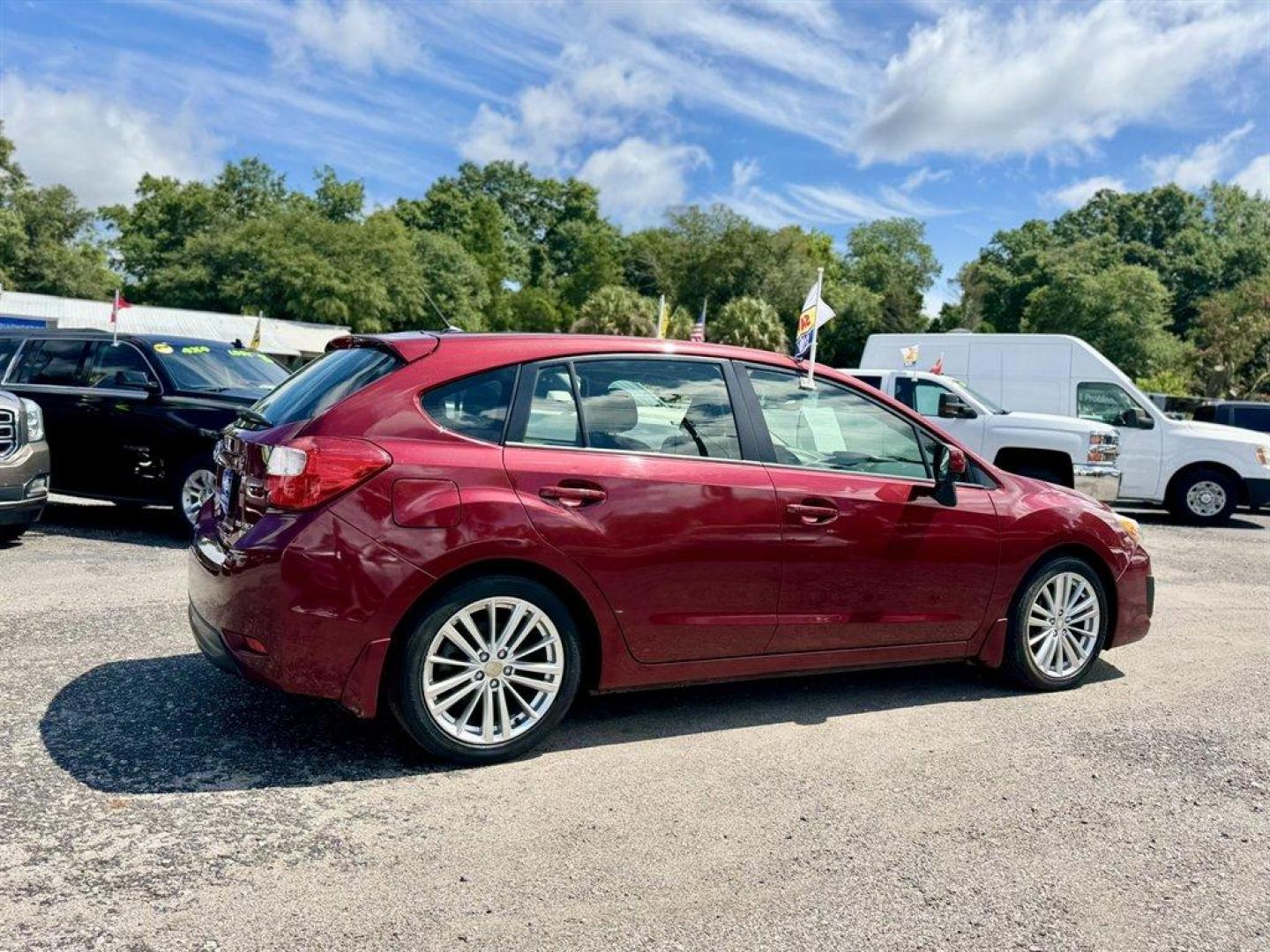 2014 Red /Black Subaru Impreza (JF1GPAD65E8) with an 2.0l H-4 Smpi Dohc 2.0l engine, Automatic transmission, located at 745 East Steele Rd., West Columbia, SC, 29170, (803) 755-9148, 33.927212, -81.148483 - Photo#3
