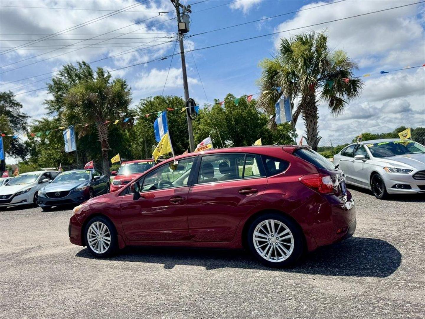 2014 Red /Black Subaru Impreza (JF1GPAD65E8) with an 2.0l H-4 Smpi Dohc 2.0l engine, Automatic transmission, located at 745 East Steele Rd., West Columbia, SC, 29170, (803) 755-9148, 33.927212, -81.148483 - Photo#5