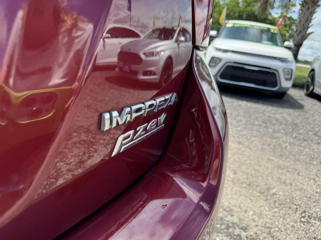 2014 Red /Black Subaru Impreza (JF1GPAD65E8) with an 2.0l H-4 Smpi Dohc 2.0l engine, Automatic transmission, located at 745 East Steele Rd., West Columbia, SC, 29170, (803) 755-9148, 33.927212, -81.148483 - Photo#27