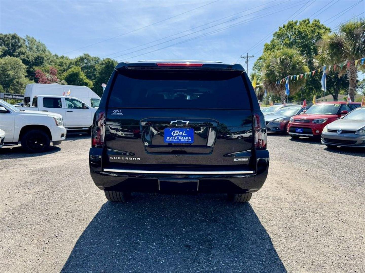 2017 Black /Black Chevrolet Suburban (1GNSKJKC6HR) with an 5.3l V8 DI VVT Flex 5.3l engine, Automatic transmission, located at 745 East Steele Rd., West Columbia, SC, 29170, (803) 755-9148, 33.927212, -81.148483- Photo#4