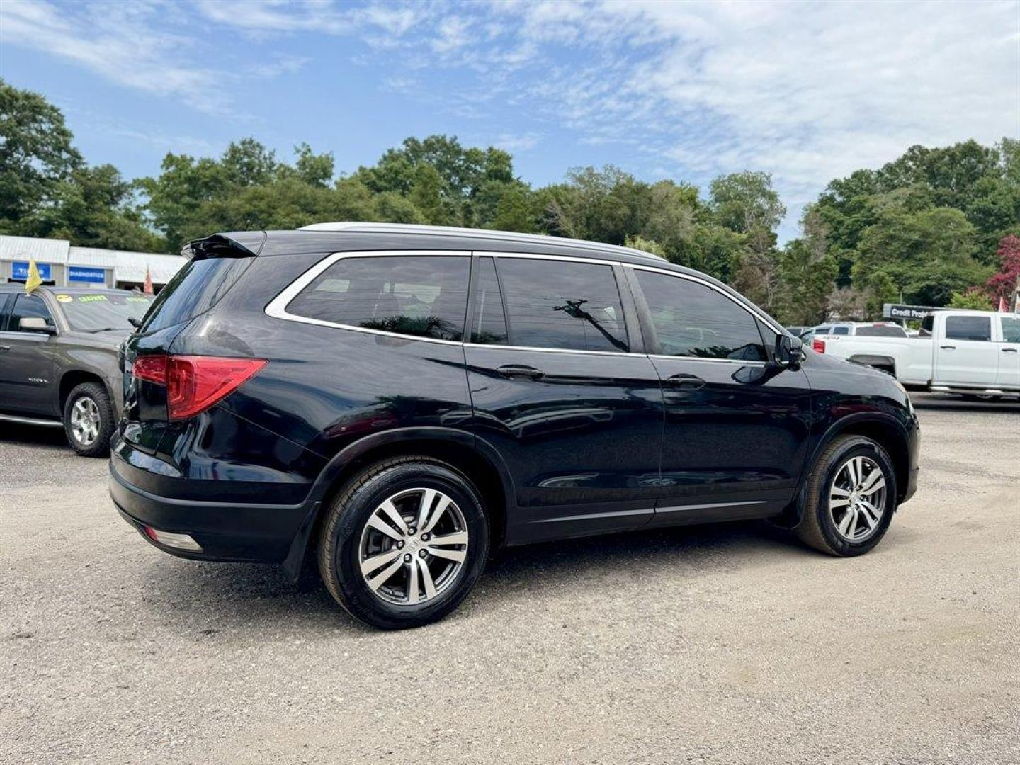 2016 Black /Black Honda Pilot (5FNYF5H65GB) with an 3.5l V6 DI Sohc I-Vtec 3. engine, Automatic transmission, located at 745 East Steele Rd., West Columbia, SC, 29170, (803) 755-9148, 33.927212, -81.148483- Photo#3