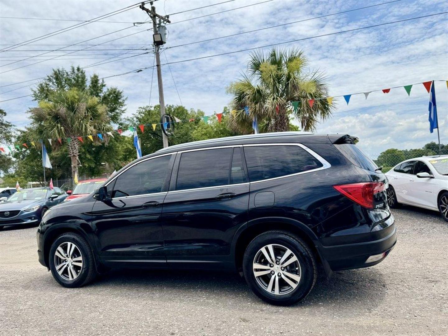 2016 Black /Black Honda Pilot (5FNYF5H65GB) with an 3.5l V6 DI Sohc I-Vtec 3. engine, Automatic transmission, located at 745 East Steele Rd., West Columbia, SC, 29170, (803) 755-9148, 33.927212, -81.148483- Photo#5