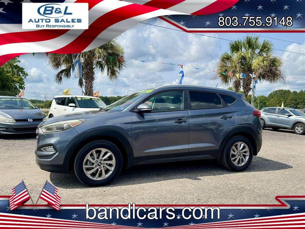 2016 Grey /Black Hyundai Tucson (KM8J33A24GU) with an 1.6l I-4 DI Dohc Cvvt T/C engine, Automatic transmission, located at 745 East Steele Rd., West Columbia, SC, 29170, (803) 755-9148, 33.927212, -81.148483- Photo#0