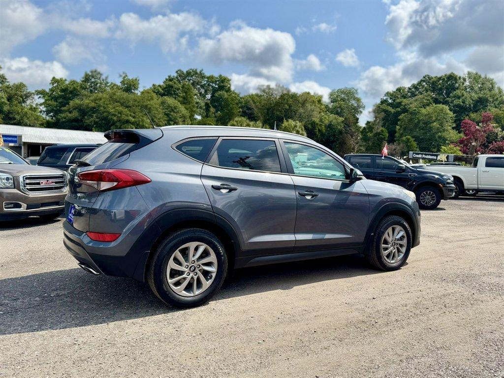 2016 Grey /Black Hyundai Tucson (KM8J33A24GU) with an 1.6l I-4 DI Dohc Cvvt T/C engine, Automatic transmission, located at 745 East Steele Rd., West Columbia, SC, 29170, (803) 755-9148, 33.927212, -81.148483- Photo#3