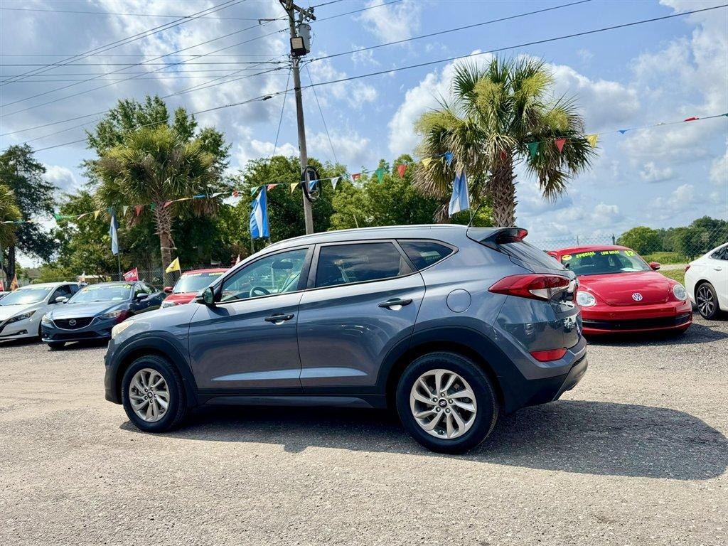 2016 Grey /Black Hyundai Tucson (KM8J33A24GU) with an 1.6l I-4 DI Dohc Cvvt T/C engine, Automatic transmission, located at 745 East Steele Rd., West Columbia, SC, 29170, (803) 755-9148, 33.927212, -81.148483- Photo#5