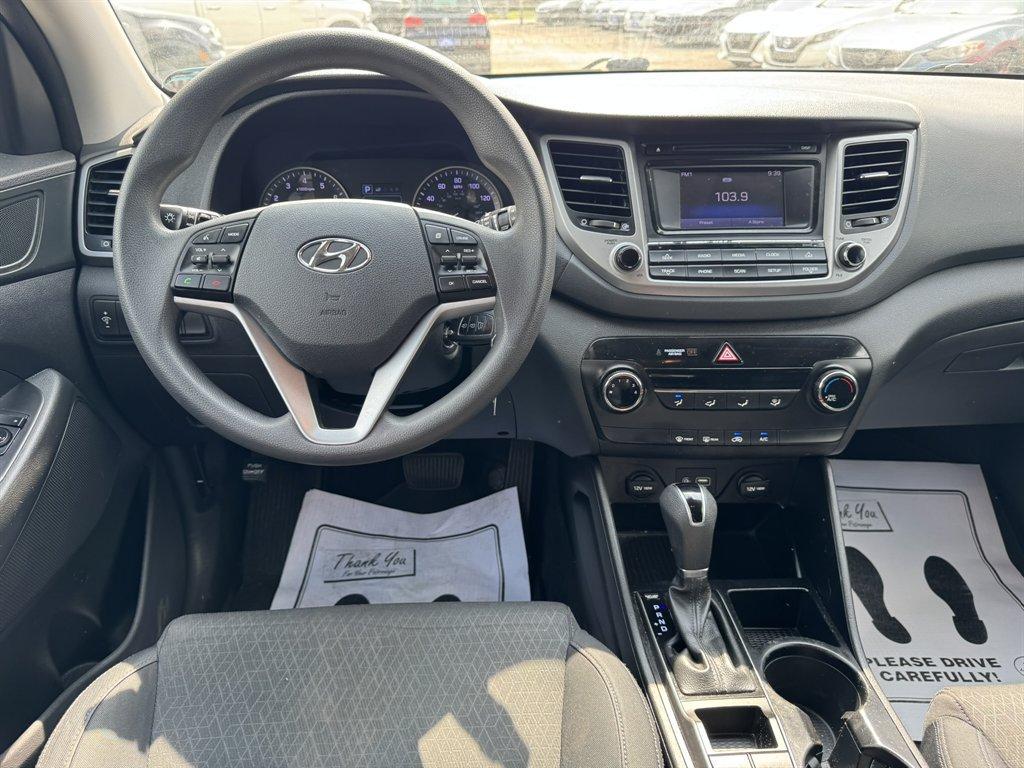 2016 Grey /Black Hyundai Tucson (KM8J33A24GU) with an 1.6l I-4 DI Dohc Cvvt T/C engine, Automatic transmission, located at 745 East Steele Rd., West Columbia, SC, 29170, (803) 755-9148, 33.927212, -81.148483- Photo#6