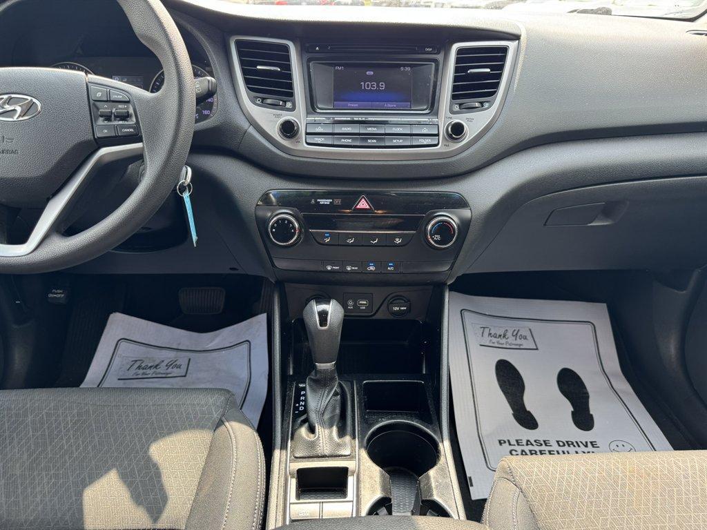 2016 Grey /Black Hyundai Tucson (KM8J33A24GU) with an 1.6l I-4 DI Dohc Cvvt T/C engine, Automatic transmission, located at 745 East Steele Rd., West Columbia, SC, 29170, (803) 755-9148, 33.927212, -81.148483- Photo#11