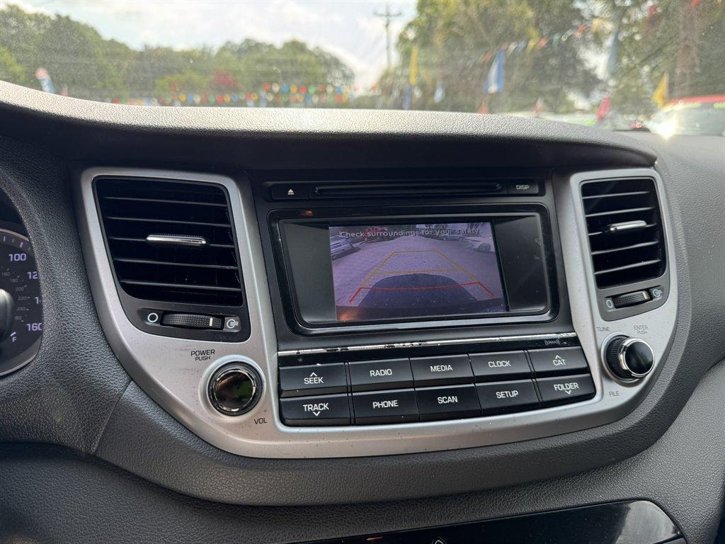2016 Grey /Black Hyundai Tucson (KM8J33A24GU) with an 1.6l I-4 DI Dohc Cvvt T/C engine, Automatic transmission, located at 745 East Steele Rd., West Columbia, SC, 29170, (803) 755-9148, 33.927212, -81.148483- Photo#14