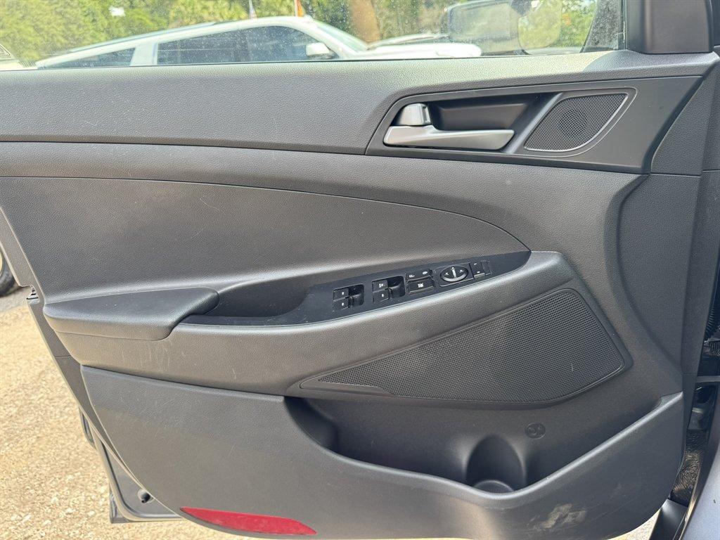 2016 Grey /Black Hyundai Tucson (KM8J33A24GU) with an 1.6l I-4 DI Dohc Cvvt T/C engine, Automatic transmission, located at 745 East Steele Rd., West Columbia, SC, 29170, (803) 755-9148, 33.927212, -81.148483- Photo#18