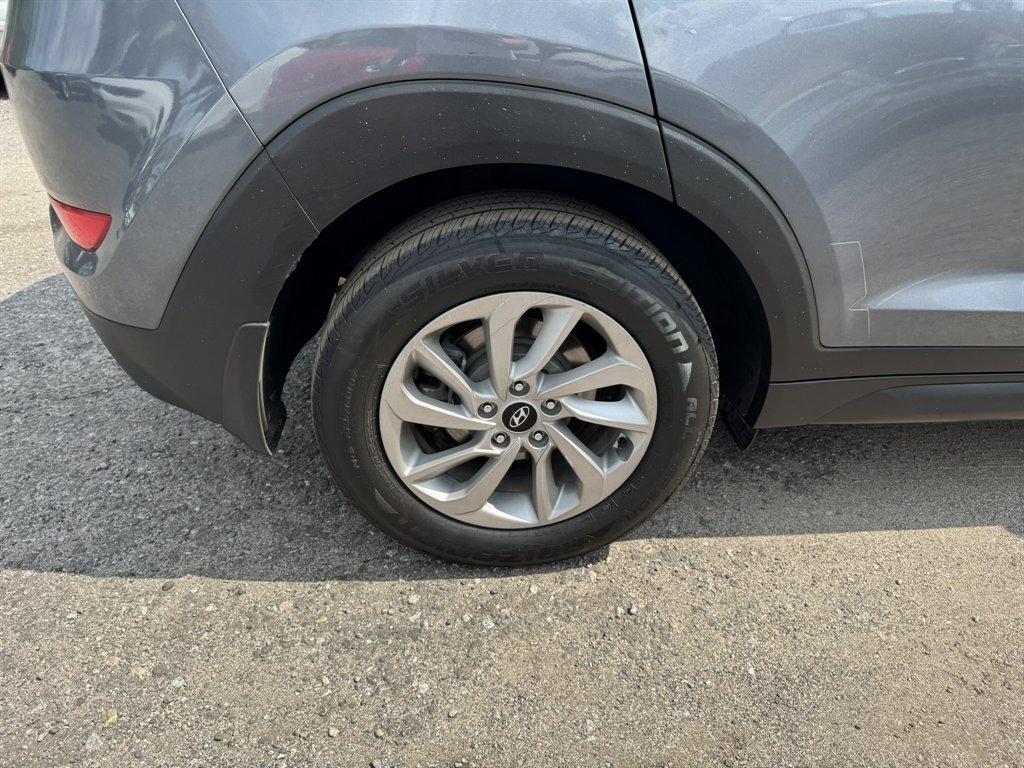 2016 Grey /Black Hyundai Tucson (KM8J33A24GU) with an 1.6l I-4 DI Dohc Cvvt T/C engine, Automatic transmission, located at 745 East Steele Rd., West Columbia, SC, 29170, (803) 755-9148, 33.927212, -81.148483- Photo#30
