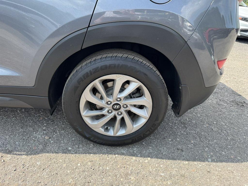 2016 Grey /Black Hyundai Tucson (KM8J33A24GU) with an 1.6l I-4 DI Dohc Cvvt T/C engine, Automatic transmission, located at 745 East Steele Rd., West Columbia, SC, 29170, (803) 755-9148, 33.927212, -81.148483- Photo#31