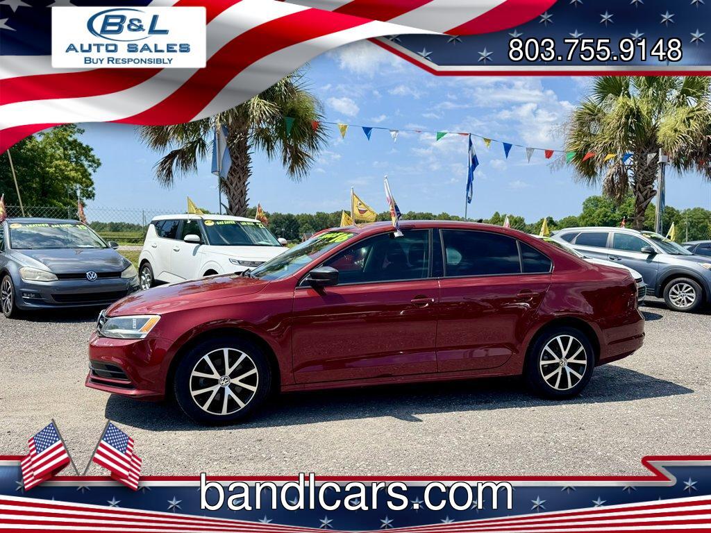 2016 Red /Black Volkswagen Jetta (3VWD67AJ0GM) with an 1.4l I-4 DI Dohc T/C 1.4l engine, Automatic transmission, located at 745 East Steele Rd., West Columbia, SC, 29170, (803) 755-9148, 33.927212, -81.148483- Photo#0