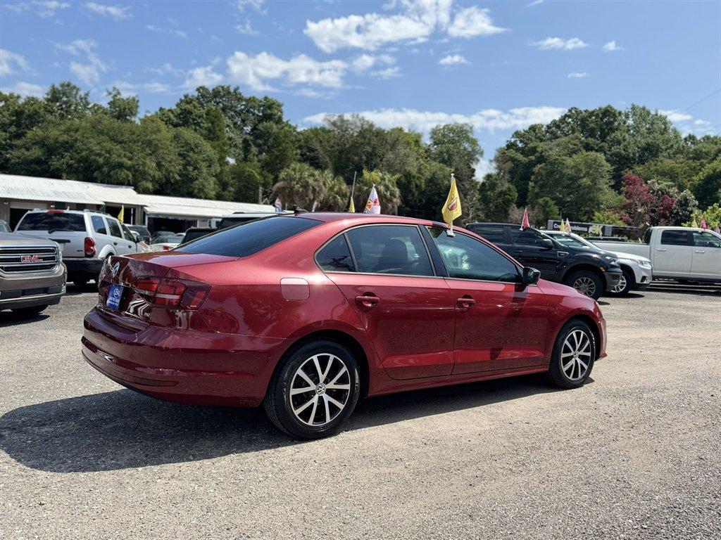 2016 Red /Black Volkswagen Jetta (3VWD67AJ0GM) with an 1.4l I-4 DI Dohc T/C 1.4l engine, Automatic transmission, located at 745 East Steele Rd., West Columbia, SC, 29170, (803) 755-9148, 33.927212, -81.148483- Photo#3