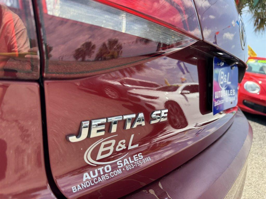 2016 Red /Black Volkswagen Jetta (3VWD67AJ0GM) with an 1.4l I-4 DI Dohc T/C 1.4l engine, Automatic transmission, located at 745 East Steele Rd., West Columbia, SC, 29170, (803) 755-9148, 33.927212, -81.148483- Photo#24