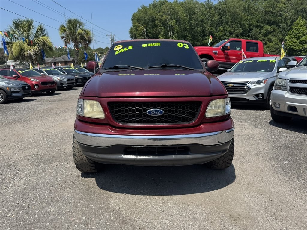 2003 Burgundy /Grey Ford F150 (1FTRX17233N) with an 4.2l V6 SPI 4.2l engine, Manual transmission, located at 745 East Steele Rd., West Columbia, SC, 29170, (803) 755-9148, 33.927212, -81.148483- Photo#1