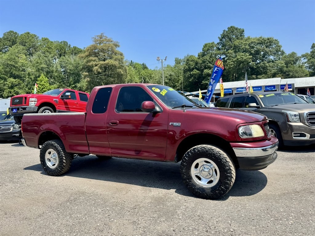 2003 Burgundy /Grey Ford F150 (1FTRX17233N) with an 4.2l V6 SPI 4.2l engine, Manual transmission, located at 745 East Steele Rd., West Columbia, SC, 29170, (803) 755-9148, 33.927212, -81.148483- Photo#2