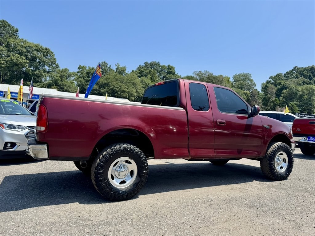 2003 Burgundy /Grey Ford F150 (1FTRX17233N) with an 4.2l V6 SPI 4.2l engine, Manual transmission, located at 745 East Steele Rd., West Columbia, SC, 29170, (803) 755-9148, 33.927212, -81.148483- Photo#3