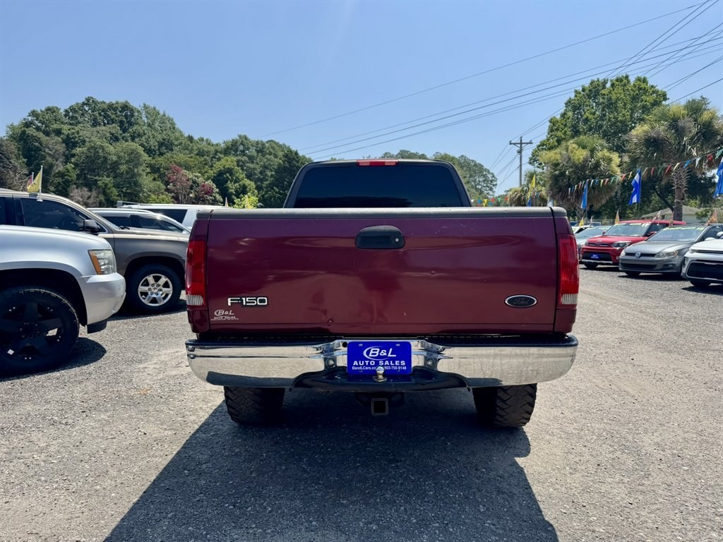 2003 Burgundy /Grey Ford F150 (1FTRX17233N) with an 4.2l V6 SPI 4.2l engine, Manual transmission, located at 745 East Steele Rd., West Columbia, SC, 29170, (803) 755-9148, 33.927212, -81.148483- Photo#4