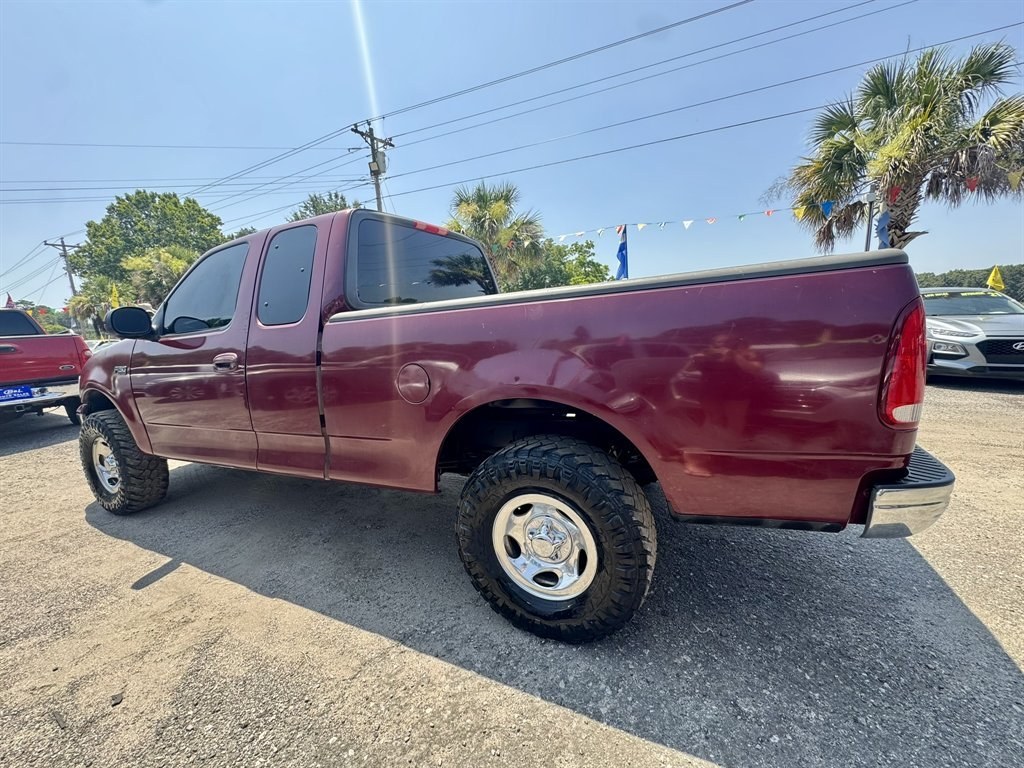 2003 Burgundy /Grey Ford F150 (1FTRX17233N) with an 4.2l V6 SPI 4.2l engine, Manual transmission, located at 745 East Steele Rd., West Columbia, SC, 29170, (803) 755-9148, 33.927212, -81.148483- Photo#5