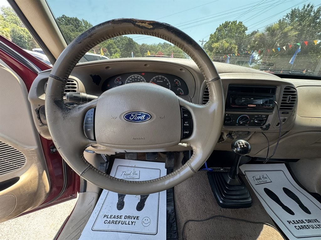 2003 Burgundy /Grey Ford F150 (1FTRX17233N) with an 4.2l V6 SPI 4.2l engine, Manual transmission, located at 745 East Steele Rd., West Columbia, SC, 29170, (803) 755-9148, 33.927212, -81.148483- Photo#6