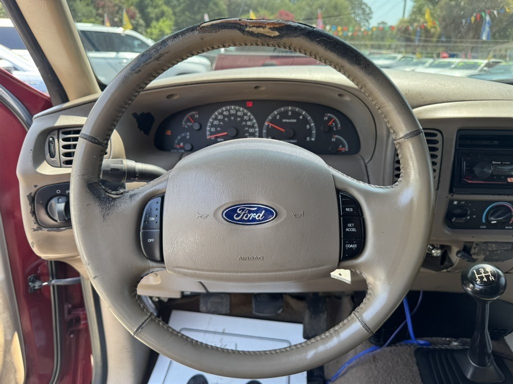 2003 Burgundy /Grey Ford F150 (1FTRX17233N) with an 4.2l V6 SPI 4.2l engine, Manual transmission, located at 745 East Steele Rd., West Columbia, SC, 29170, (803) 755-9148, 33.927212, -81.148483- Photo#7
