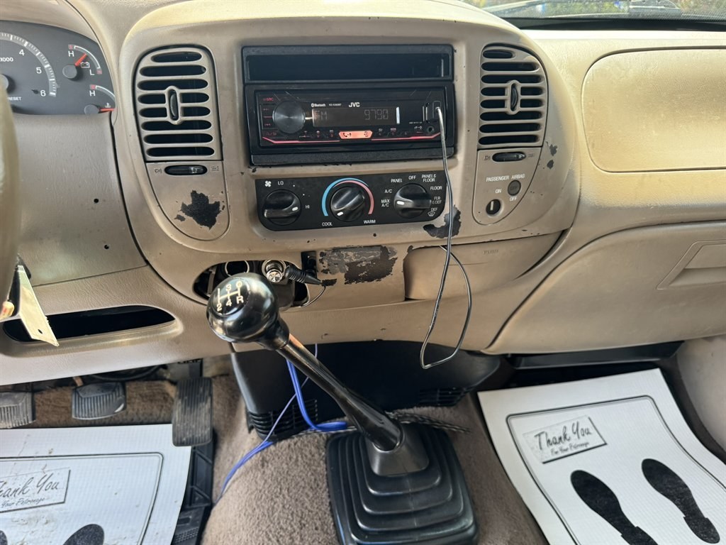 2003 Burgundy /Grey Ford F150 (1FTRX17233N) with an 4.2l V6 SPI 4.2l engine, Manual transmission, located at 745 East Steele Rd., West Columbia, SC, 29170, (803) 755-9148, 33.927212, -81.148483- Photo#11