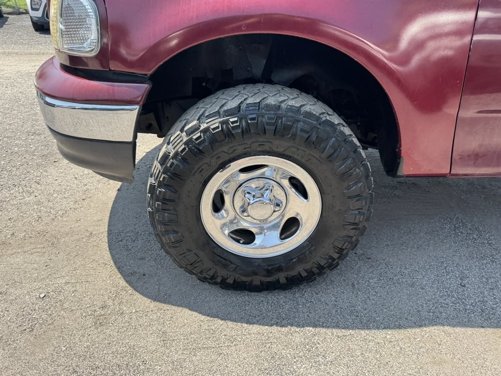 2003 Burgundy /Grey Ford F150 (1FTRX17233N) with an 4.2l V6 SPI 4.2l engine, Manual transmission, located at 745 East Steele Rd., West Columbia, SC, 29170, (803) 755-9148, 33.927212, -81.148483- Photo#25