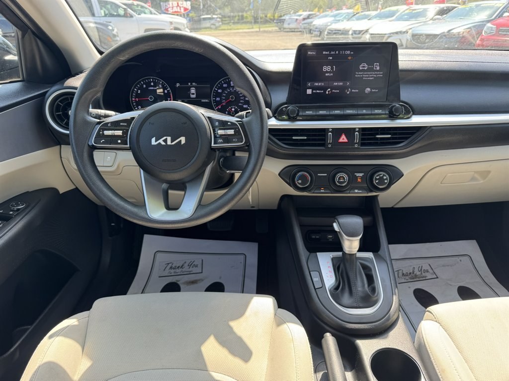 2023 Black /Taupe Kia Forte (3KPF24AD2PE) with an 2.0l I-4 MPI Dohc 2.0l engine, Automatic transmission, located at 745 East Steele Rd., West Columbia, SC, 29170, (803) 755-9148, 33.927212, -81.148483- Photo#6