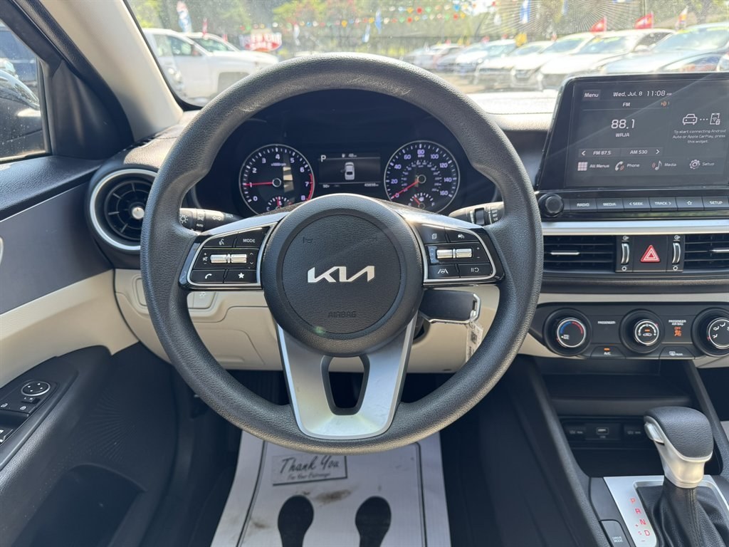 2023 Black /Taupe Kia Forte (3KPF24AD2PE) with an 2.0l I-4 MPI Dohc 2.0l engine, Automatic transmission, located at 745 East Steele Rd., West Columbia, SC, 29170, (803) 755-9148, 33.927212, -81.148483- Photo#7