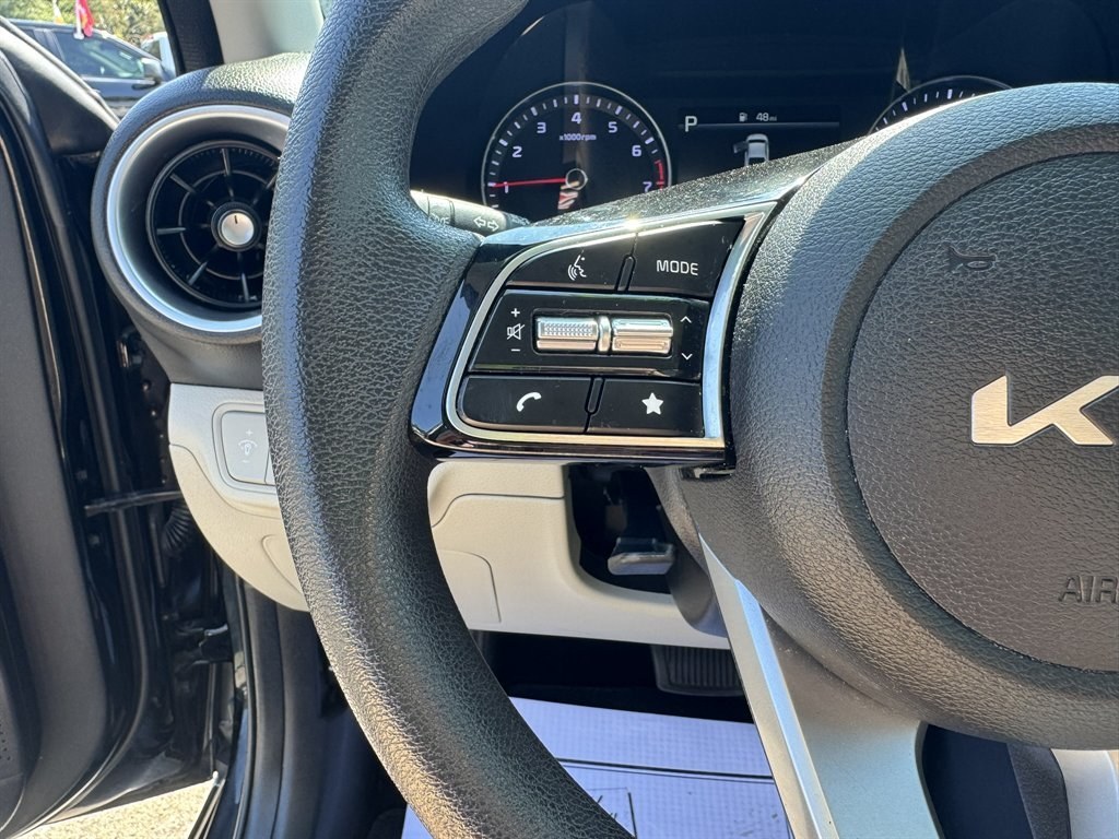 2023 Black /Taupe Kia Forte (3KPF24AD2PE) with an 2.0l I-4 MPI Dohc 2.0l engine, Automatic transmission, located at 745 East Steele Rd., West Columbia, SC, 29170, (803) 755-9148, 33.927212, -81.148483- Photo#8