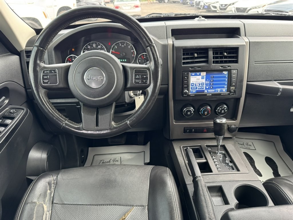 2012 Black /Black Jeep Liberty (1C4PJLAK2CW) with an 3.7l V6 MPI 3.7l engine, Automatic transmission, located at 745 East Steele Rd., West Columbia, SC, 29170, (803) 755-9148, 33.927212, -81.148483- Photo#6
