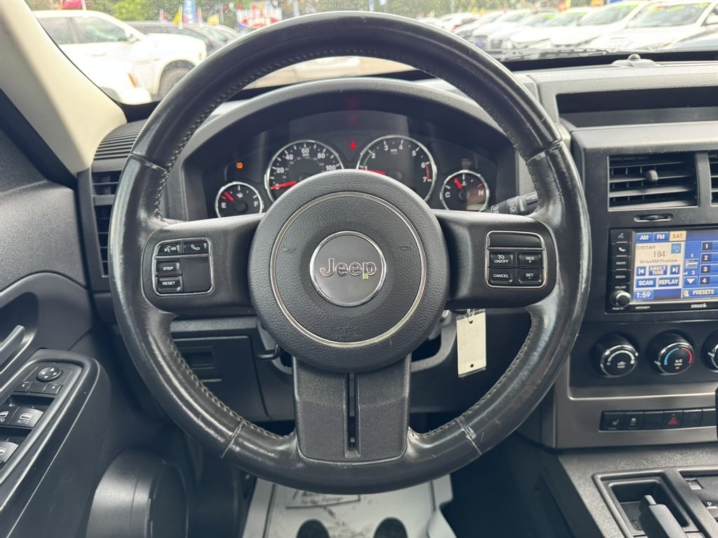 2012 Black /Black Jeep Liberty (1C4PJLAK2CW) with an 3.7l V6 MPI 3.7l engine, Automatic transmission, located at 745 East Steele Rd., West Columbia, SC, 29170, (803) 755-9148, 33.927212, -81.148483- Photo#7