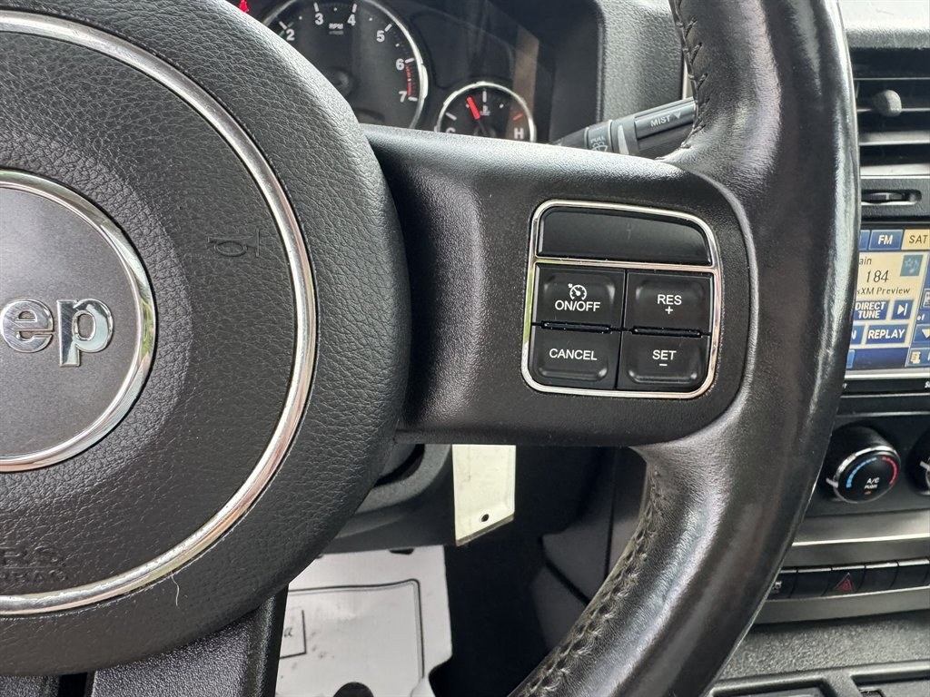 2012 Black /Black Jeep Liberty (1C4PJLAK2CW) with an 3.7l V6 MPI 3.7l engine, Automatic transmission, located at 745 East Steele Rd., West Columbia, SC, 29170, (803) 755-9148, 33.927212, -81.148483- Photo#9