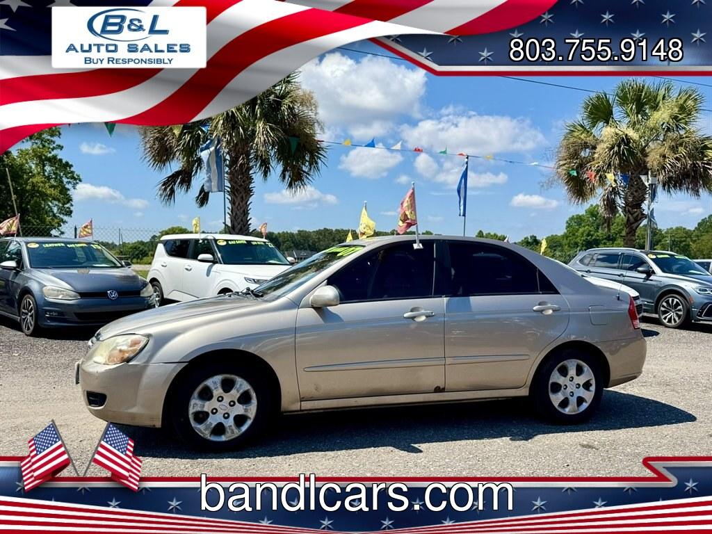 2007 Gold /Taupe Kia Spectra (KNAFE121475) with an 2.0l I-4 EFI Dohc 2.0l engine, Automatic transmission, located at 745 East Steele Rd., West Columbia, SC, 29170, (803) 755-9148, 33.927212, -81.148483- Photo#0