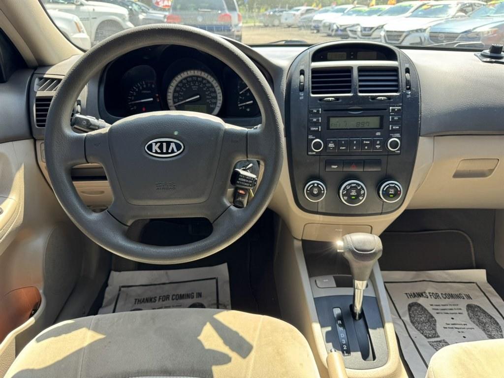 2007 Gold /Taupe Kia Spectra (KNAFE121475) with an 2.0l I-4 EFI Dohc 2.0l engine, Automatic transmission, located at 745 East Steele Rd., West Columbia, SC, 29170, (803) 755-9148, 33.927212, -81.148483- Photo#6