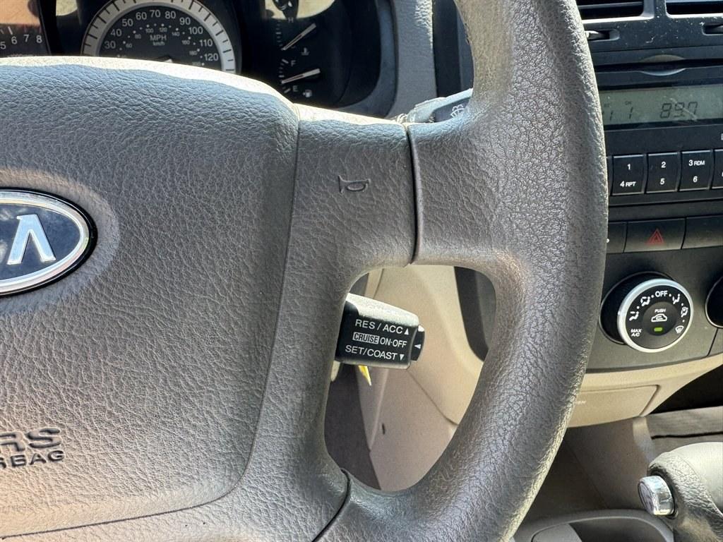 2007 Gold /Taupe Kia Spectra (KNAFE121475) with an 2.0l I-4 EFI Dohc 2.0l engine, Automatic transmission, located at 745 East Steele Rd., West Columbia, SC, 29170, (803) 755-9148, 33.927212, -81.148483- Photo#8
