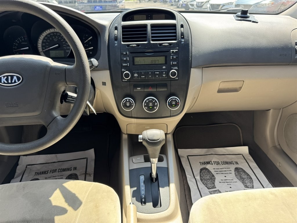 2007 Gold /Taupe Kia Spectra (KNAFE121475) with an 2.0l I-4 EFI Dohc 2.0l engine, Automatic transmission, located at 745 East Steele Rd., West Columbia, SC, 29170, (803) 755-9148, 33.927212, -81.148483- Photo#10