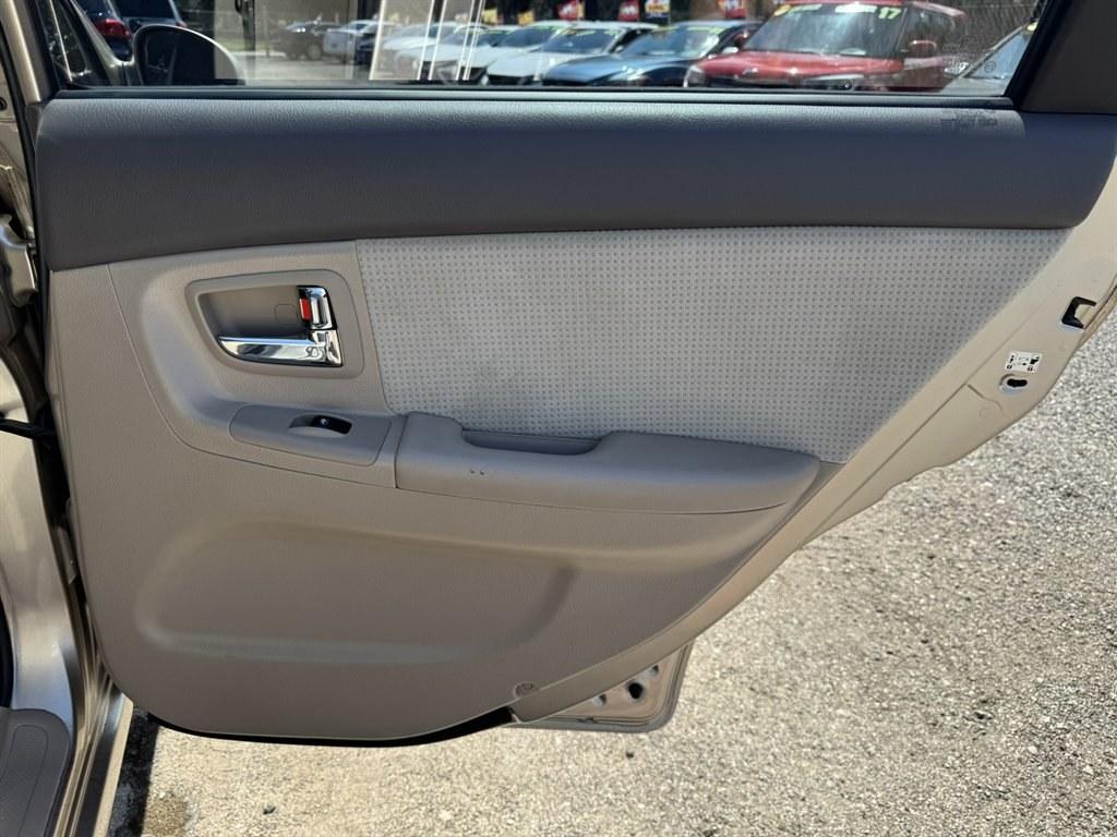 2007 Gold /Taupe Kia Spectra (KNAFE121475) with an 2.0l I-4 EFI Dohc 2.0l engine, Automatic transmission, located at 745 East Steele Rd., West Columbia, SC, 29170, (803) 755-9148, 33.927212, -81.148483- Photo#19