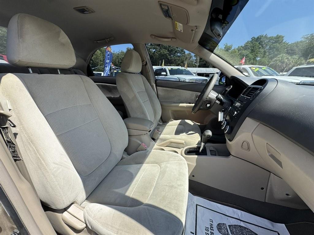 2007 Gold /Taupe Kia Spectra (KNAFE121475) with an 2.0l I-4 EFI Dohc 2.0l engine, Automatic transmission, located at 745 East Steele Rd., West Columbia, SC, 29170, (803) 755-9148, 33.927212, -81.148483- Photo#22