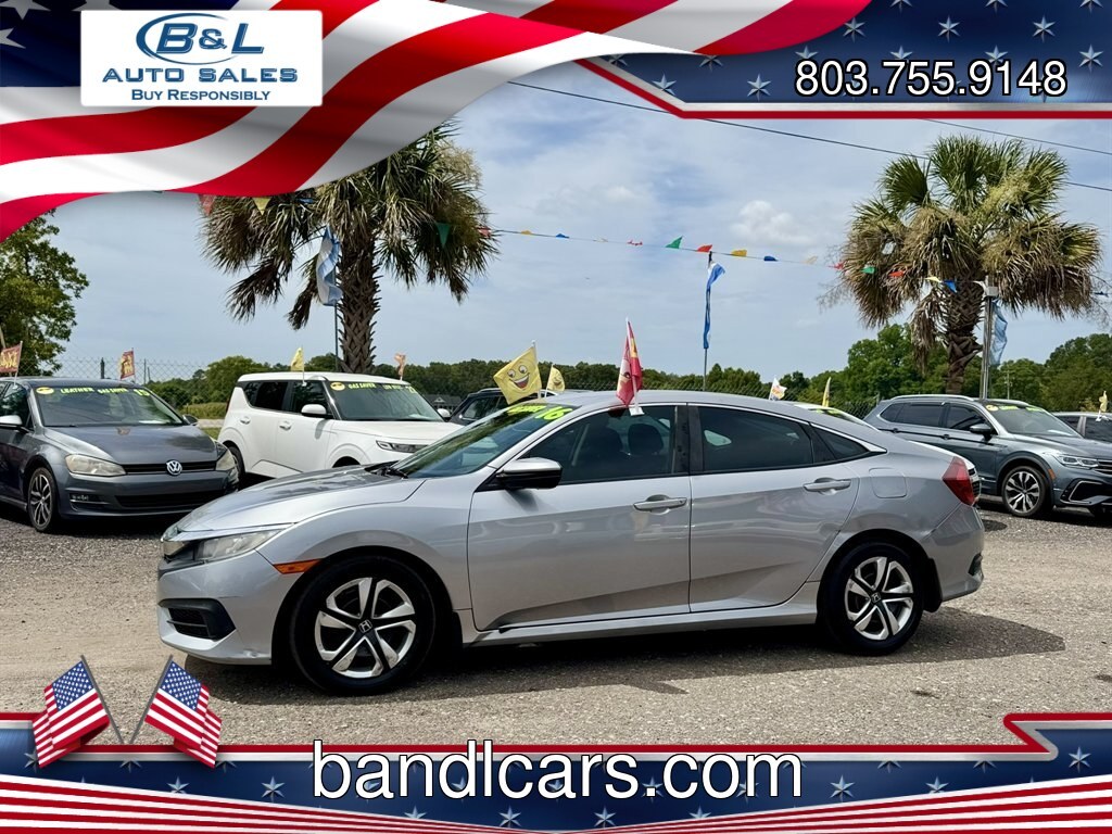 2016 Silver /Black Honda Civic (2HGFC2F50GH) with an 2.0l I-4 MPI Dohc 2.0l engine, Automatic transmission, located at 745 East Steele Rd., West Columbia, SC, 29170, (803) 755-9148, 33.927212, -81.148483- Photo#0