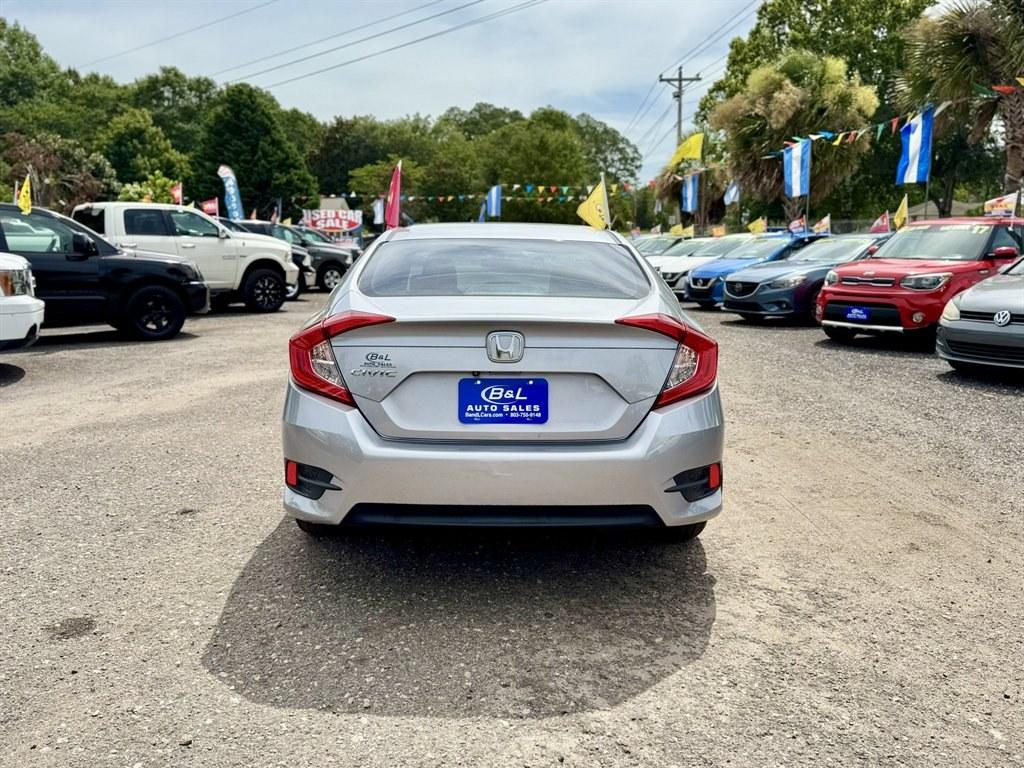 2016 Silver /Black Honda Civic (2HGFC2F50GH) with an 2.0l I-4 MPI Dohc 2.0l engine, Automatic transmission, located at 745 East Steele Rd., West Columbia, SC, 29170, (803) 755-9148, 33.927212, -81.148483- Photo#4