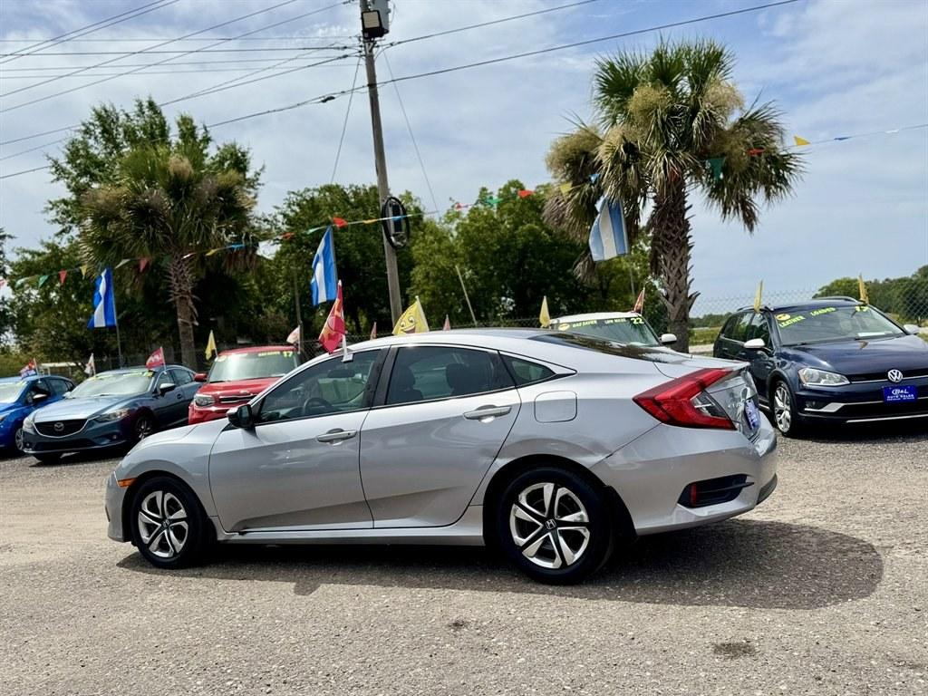 2016 Silver /Black Honda Civic (2HGFC2F50GH) with an 2.0l I-4 MPI Dohc 2.0l engine, Automatic transmission, located at 745 East Steele Rd., West Columbia, SC, 29170, (803) 755-9148, 33.927212, -81.148483- Photo#5