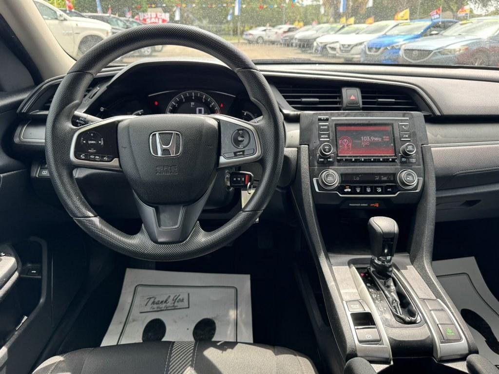 2016 Silver /Black Honda Civic (2HGFC2F50GH) with an 2.0l I-4 MPI Dohc 2.0l engine, Automatic transmission, located at 745 East Steele Rd., West Columbia, SC, 29170, (803) 755-9148, 33.927212, -81.148483- Photo#6