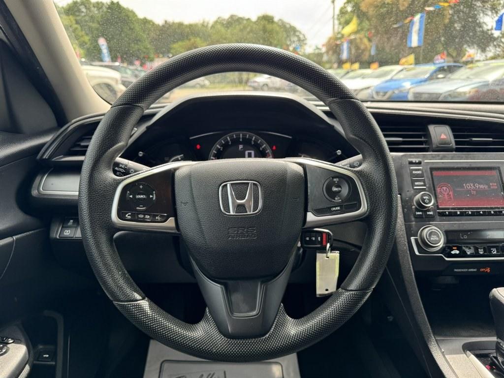 2016 Silver /Black Honda Civic (2HGFC2F50GH) with an 2.0l I-4 MPI Dohc 2.0l engine, Automatic transmission, located at 745 East Steele Rd., West Columbia, SC, 29170, (803) 755-9148, 33.927212, -81.148483- Photo#7