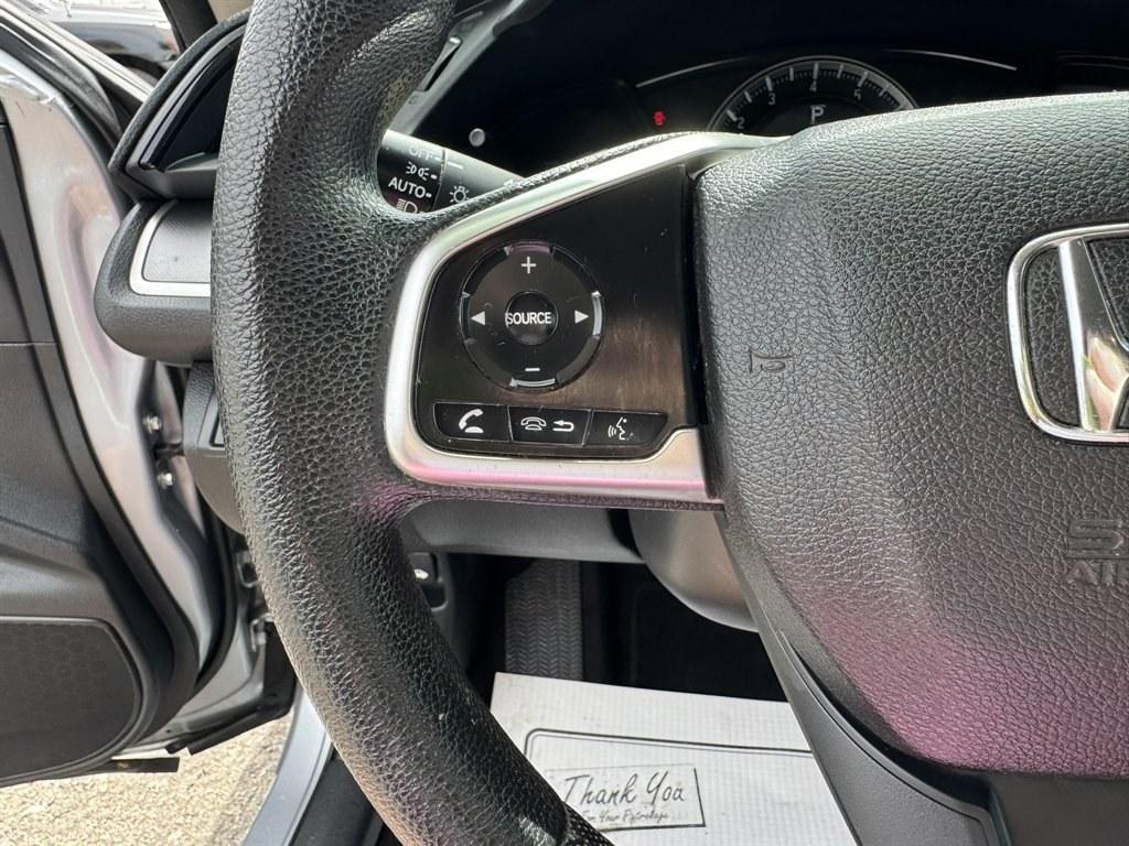 2016 Silver /Black Honda Civic (2HGFC2F50GH) with an 2.0l I-4 MPI Dohc 2.0l engine, Automatic transmission, located at 745 East Steele Rd., West Columbia, SC, 29170, (803) 755-9148, 33.927212, -81.148483- Photo#8