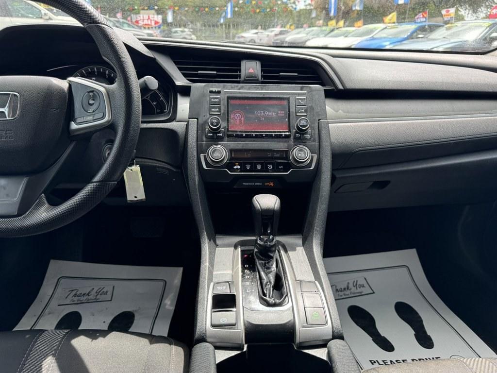 2016 Silver /Black Honda Civic (2HGFC2F50GH) with an 2.0l I-4 MPI Dohc 2.0l engine, Automatic transmission, located at 745 East Steele Rd., West Columbia, SC, 29170, (803) 755-9148, 33.927212, -81.148483- Photo#11