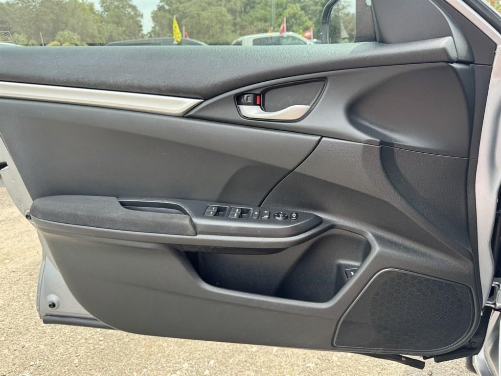 2016 Silver /Black Honda Civic (2HGFC2F50GH) with an 2.0l I-4 MPI Dohc 2.0l engine, Automatic transmission, located at 745 East Steele Rd., West Columbia, SC, 29170, (803) 755-9148, 33.927212, -81.148483- Photo#16