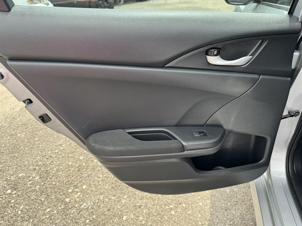 2016 Silver /Black Honda Civic (2HGFC2F50GH) with an 2.0l I-4 MPI Dohc 2.0l engine, Automatic transmission, located at 745 East Steele Rd., West Columbia, SC, 29170, (803) 755-9148, 33.927212, -81.148483- Photo#19