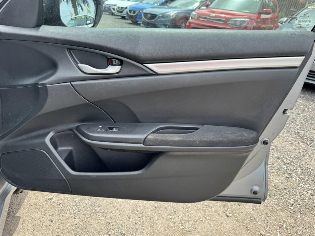 2016 Silver /Black Honda Civic (2HGFC2F50GH) with an 2.0l I-4 MPI Dohc 2.0l engine, Automatic transmission, located at 745 East Steele Rd., West Columbia, SC, 29170, (803) 755-9148, 33.927212, -81.148483- Photo#23